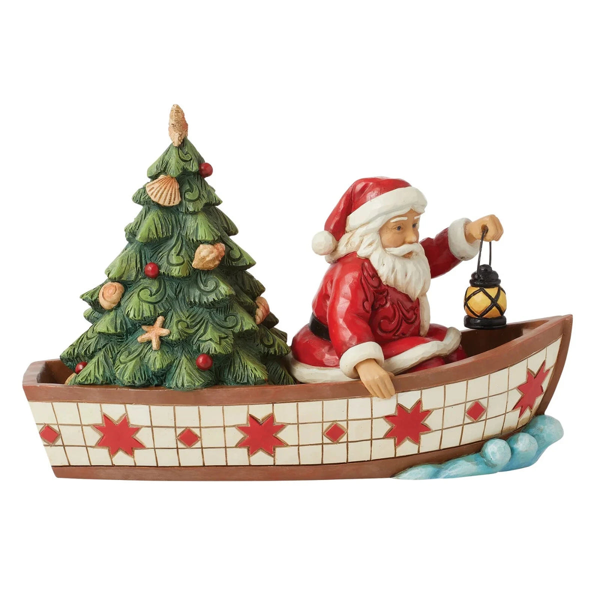 Santa in Boat With Tree Figurine