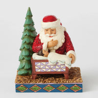 Santa Kneeling over Baby Jesus
