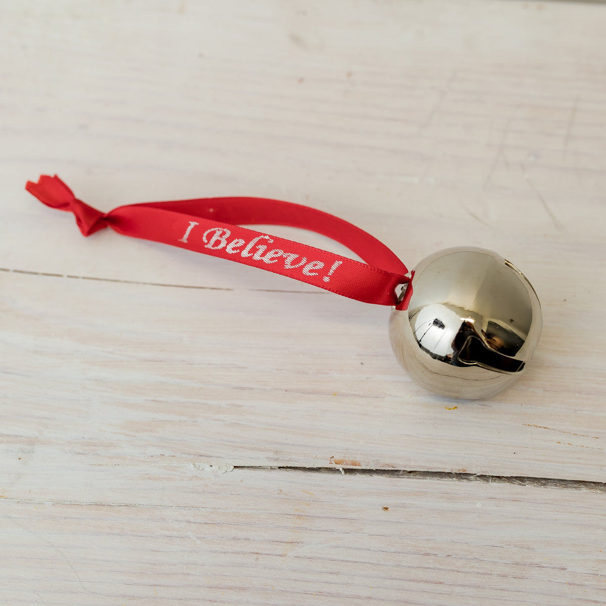 1.5" Nickel Bell with Red Believe Ribbon